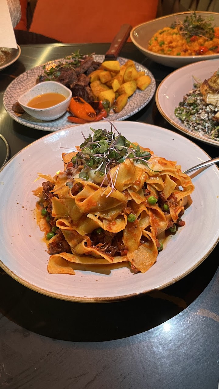 Pappardelle and plated mains at Planar Restaurant